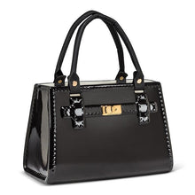 Load image into Gallery viewer, Handbag-shaped ceramic vase with faux leather handle and chic hardware-style detail, available in white, black, and pink