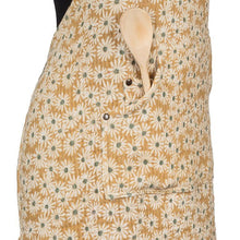 Load image into Gallery viewer, Daisy Daydream Apron styled for baking with utensils and a warm kitchen setting