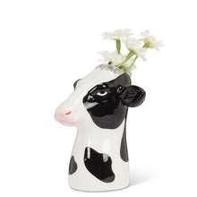 Load image into Gallery viewer, Ceramic Holstein cow head bud vase in glossy black and white with a small opening at the top, shown on a white background