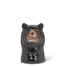 Load image into Gallery viewer, Ceramic black bear head bud vase in glossy black with brown detailing and a small opening at the top, shown on a white background