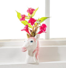 Load image into Gallery viewer, Ceramic unicorn head bud vase in glossy white with a pink mane and gold horn, featuring a small opening at the top, shown on a white background