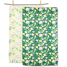 Load image into Gallery viewer, Double-sided kitchen towel with pastel pink and yellow floral pattern, hanging on a line with clothespins
