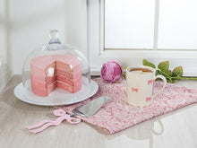 Load image into Gallery viewer, Set of four pink cotton jacquard placemats with woven rose floral pattern