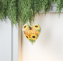 Load image into Gallery viewer, Harvest Bloom embroidered heart ornament with orange pumpkin and yellow sunflowers