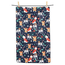 Load image into Gallery viewer, Paws and Peppermint holiday dog kitchen towel with festive dogs candy canes poinsettias and winter stars on navy