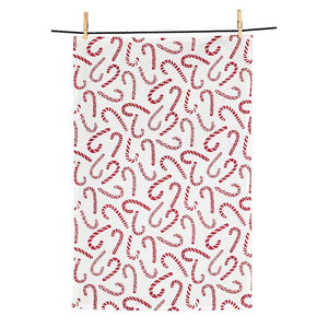 White cotton kitchen towel with red candy cane print, 18×28"
