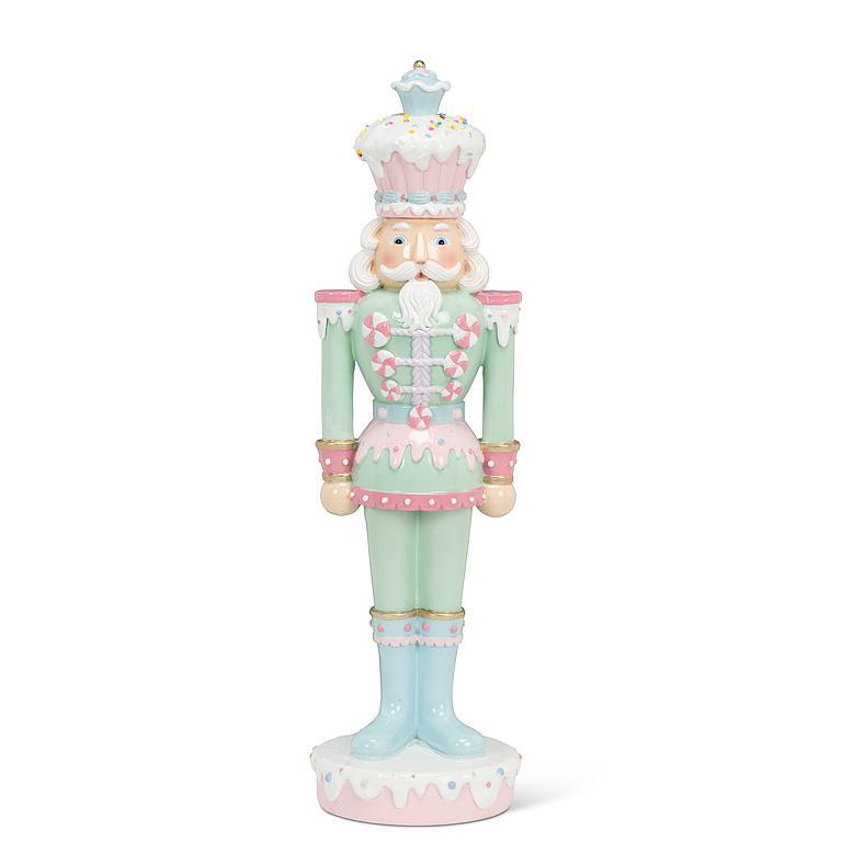 Cupcake Crown Nutcracker—pastel holiday figurine with cupcake hat and candy details, 18 inches tall