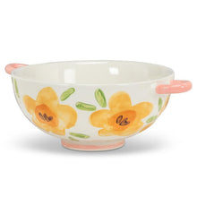 Load image into Gallery viewer, Ivory stoneware colander with yellow floral pattern, green leaves, and pink handles
