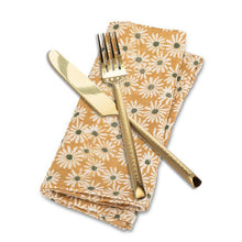 Load image into Gallery viewer, Yellow cotton napkin with white daisy floral pattern and green centres
