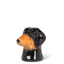 Load image into Gallery viewer, Ceramic dachshund head bud vase in glossy black and brown with a small opening at the top, shown on a white background
