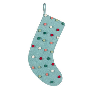 Icy aqua wool stocking with multicolor felt pom poms, hanging loop at top.