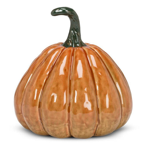 Glossy orange pumpkin with green stem on white background, 8 inches tall