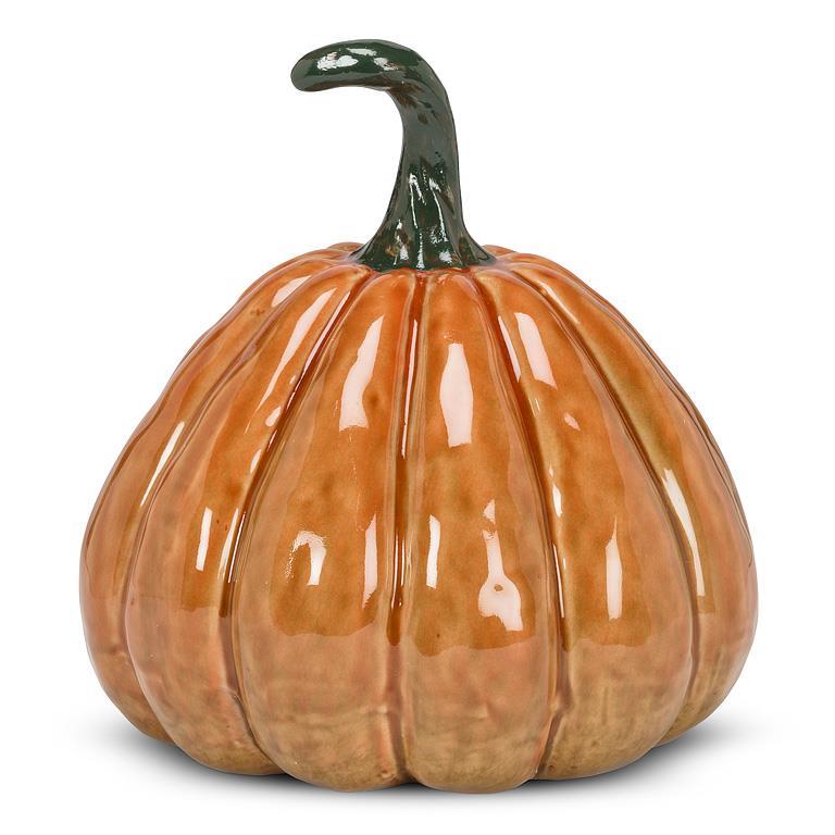 Glossy orange pumpkin with green stem on white background, 8 inches tall