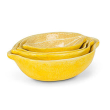 Load image into Gallery viewer, Set of four yellow ceramic lemon-shaped nesting bowls with citrus pattern detailing inside
