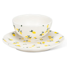 Load image into Gallery viewer, White bone china appetizer plate with scattered yellow lemon and green leaf pattern
