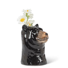 Load image into Gallery viewer, Ceramic black bear head bud vase in glossy black with brown detailing and a small opening at the top, shown on a white background
