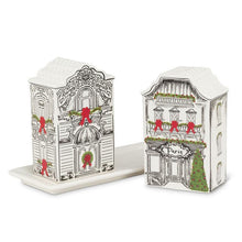 Load image into Gallery viewer, Ceramic Parisian storefront salt and pepper shaker set with festive garland and red bow details on a tray
