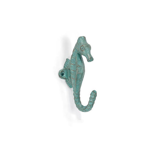 Cast-iron seahorse wall hook with a gently weathered verdigris finish, 5 inches tall