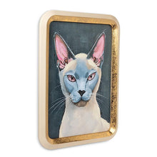 Load image into Gallery viewer, Gold-framed wall art featuring a Siamese cat portrait with blue eyes and pink-toned ears on a dark grey
