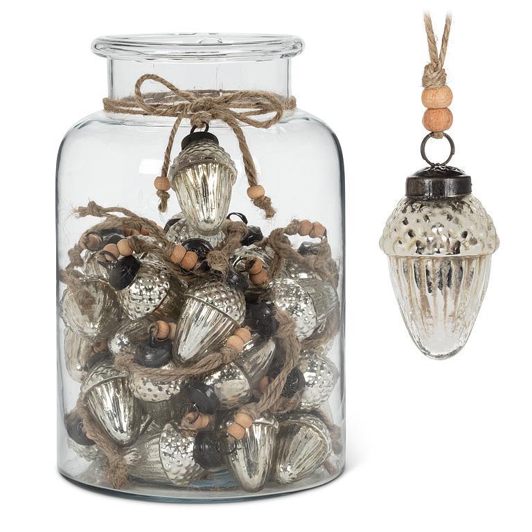 Jar filled with 60 silvered-glass acorn ornaments with jute hangers – Amalsroom
