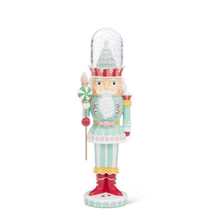 Peppermint Regent Snow Globe—pastel soldier figurine with candy scepter and cake-top dome, 13 inches