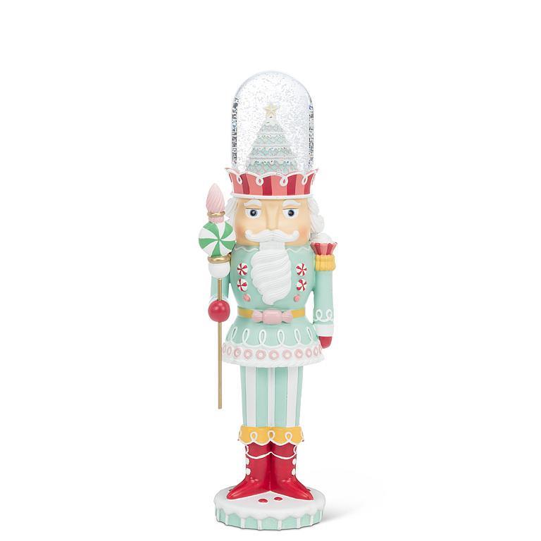 Peppermint Regent Snow Globe—pastel soldier figurine with candy scepter and cake-top dome, 13 inches