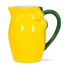 Load image into Gallery viewer, Glossy yellow ceramic lemon pitcher with green handle and sculpted lemon detail
