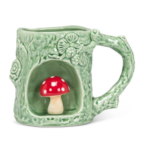Green bark-textured stoneware mug with a red toadstool in an alcove, 11 oz