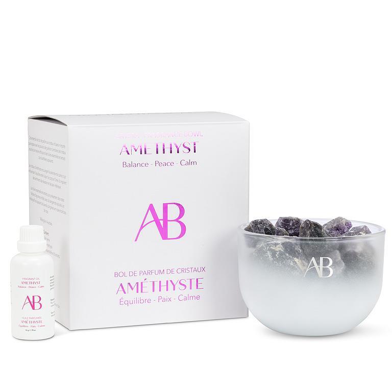Fragrance bowl with natural amethyst crystals and essential oils in lavender, rose geranium, bergamot, and rosewood.