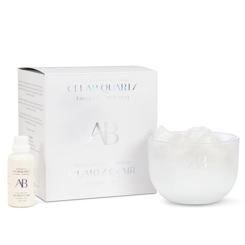 Fragrance bowl with Clear Quartz crystals and essential oils in guava, lychee, melon, and orange blossom.