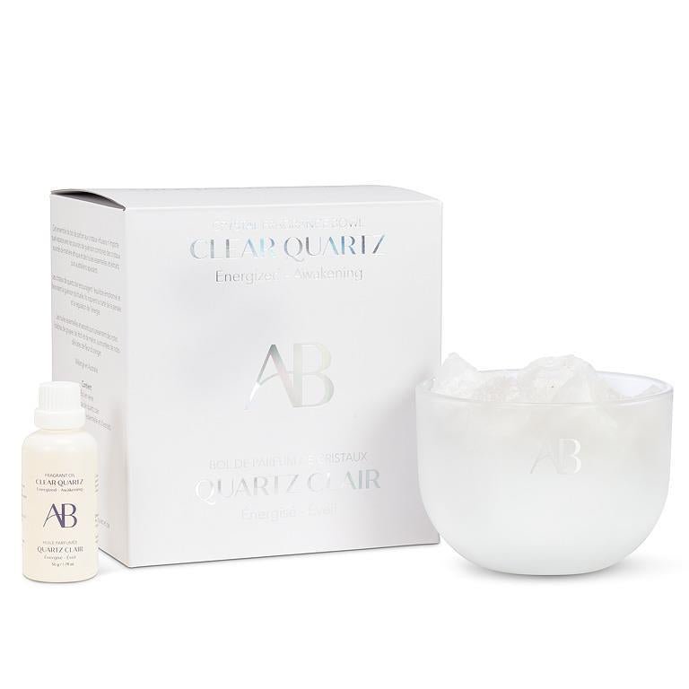 Fragrance bowl with Clear Quartz crystals and essential oils in guava, lychee, melon, and orange blossom.